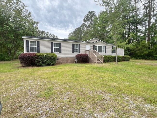 Building Photo - AVAILABLE NOW | PETS PERMITTED OUTDOORS ON...