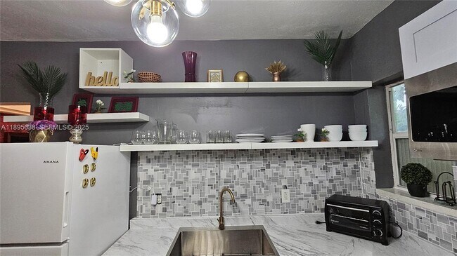 Building Photo - 4201 SW 60th Pl