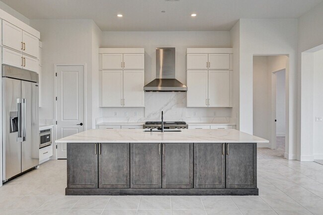 Building Photo - Experience elevated living at Guard Gated ...