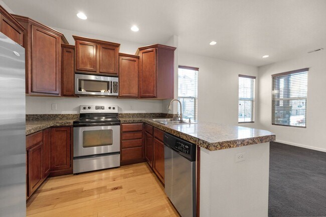Building Photo - Beautiful 2 bdrm end unit with attach 2 car garage