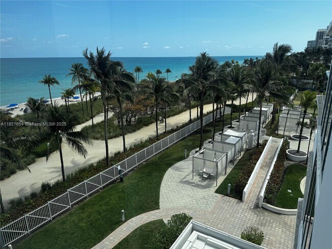 Building Photo - 10275 Collins Ave