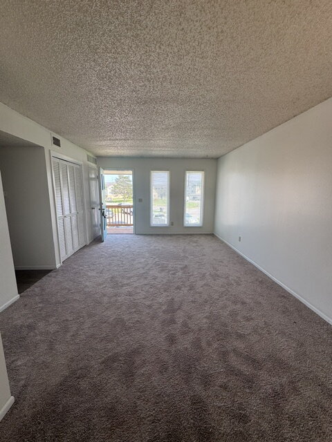Building Photo - Come see this cozy 2 Bedroom, 1 Bathroom Upstairs Apartment!