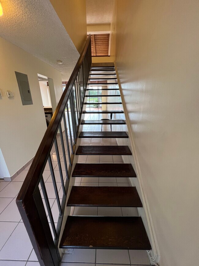 Staircase leading to 2nd floor - 1424 SW 131st Place Cir E