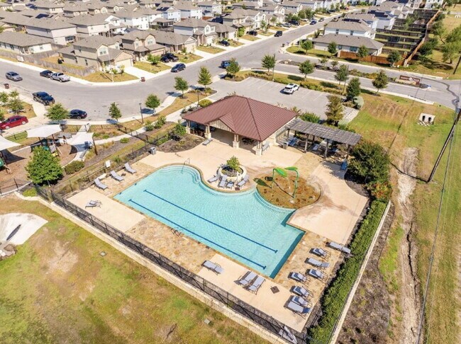 Building Photo - MOVE-IN READY | SOLAR PANELS | GREENBELT | COMMUNITY POOL & SPLASH PAD