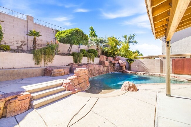 Building Photo - Beautiful 4-Bedroom Home with Pool & Rock Waterfall in 89002