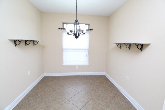 Building Photo - Beautiful 3BR/2BA Brick Home with Granite Kitchen, Covered Patio, Fire Pit & 2-Car Garage Near I-10