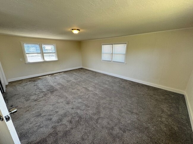 Building Photo - 2 bed 1.5 house with garage storage