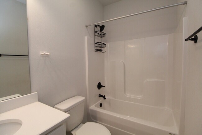 Building Photo - Sweetbarb Estates 3BR Home Near I-10 & Pine Forest Rd with Quartz Kitchen, LVP Flooring, 2-Car Ga...