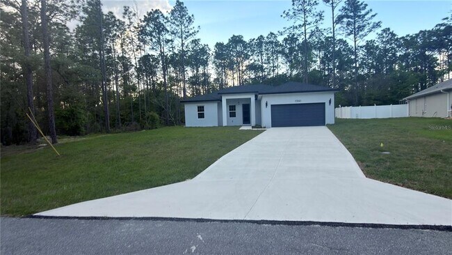 Building Photo - 7250 N Freeport Cir