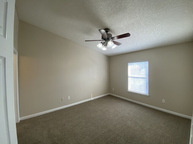 Building Photo - Beautifully Updated & Spacious 3BR/2BA Condo in a Secure Gated Community — Includes Cable, Intern...