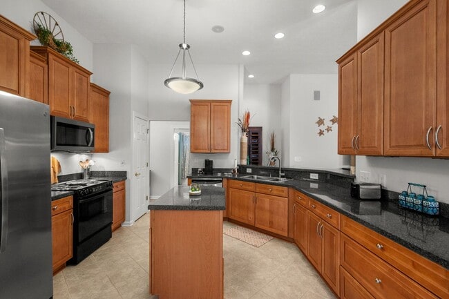 Building Photo - Live the Coastal Lifestyle in This Cypress Keys Beauty!