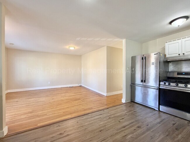 Building Photo - Solid Brick and Renovated with New Kitchen and Two Full Baths!