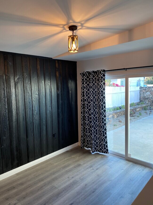 Den with new sliding door to patio and yard - 17423 Burbank Blvd