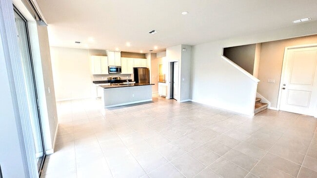 Building Photo - Annual UNfurnished NEW 4/ 2 1/2 home off S...