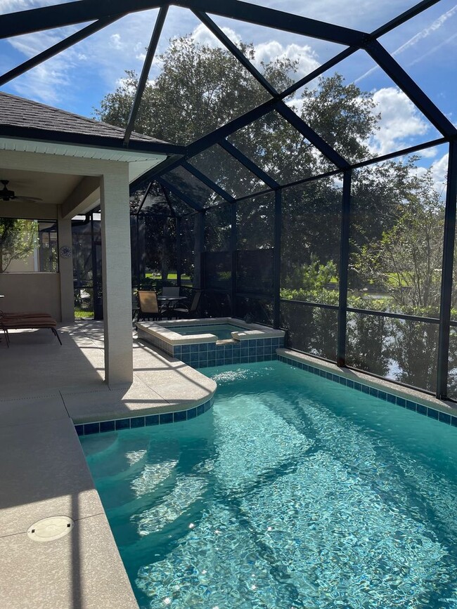 Building Photo - Custom 3/2/2 House with Pool in Grand Have...