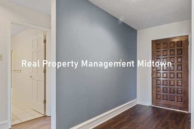 Building Photo - Charming Condo in Established Community of...