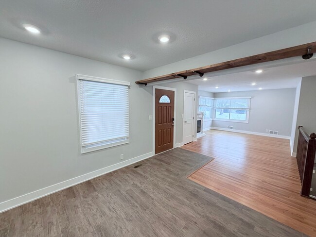 Building Photo - Spacious 4-Bedroom Home with Pond Views & EV-Ready Garage – Bloomington!!