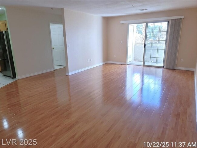 Building Photo - Inviting Green Valley Condo with Dual Balc...