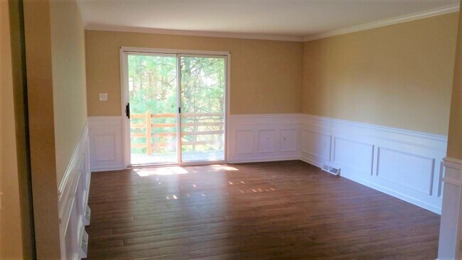 Living Room and Door to Balcony - 301 N Duke St