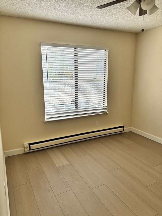 Building Photo - NEWLY REMODELED CONDO - 1 BED/1 BATH UPSTA...