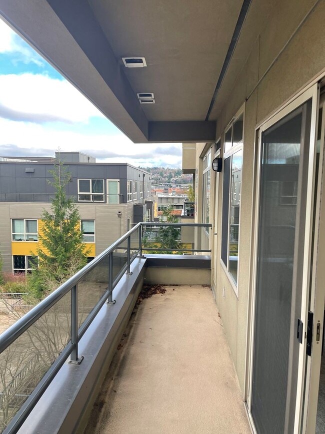 Building Photo - Updated Condo with Parking for One, Great Location and Communal Roof-top Deck!!