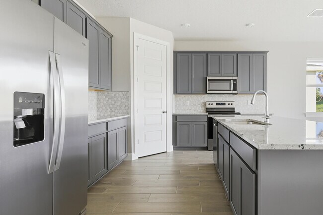 Building Photo - 8558 Dahlia Cir