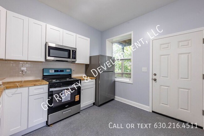 Building Photo - 6433 S Vernon Ave
