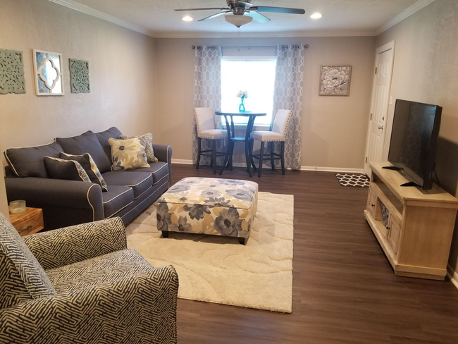 Living dining area (furniture not included) - 1822 Avenue M 1/2