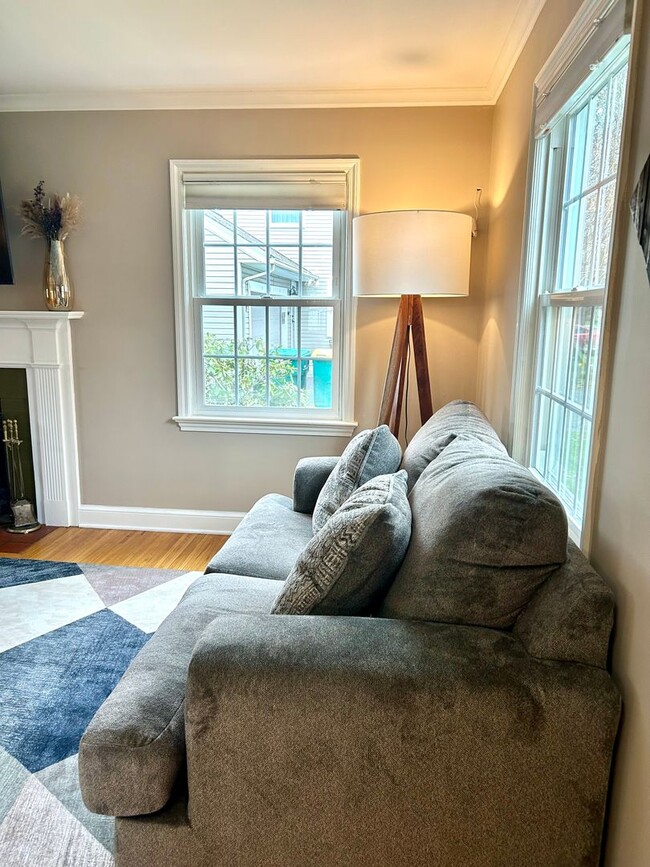 Building Photo - Sunroom Retreat | Fully Furnished 3BR with Private Fenced Yard