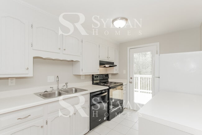 Building Photo - Turn the key. Enter. Smile. Repeat every day!