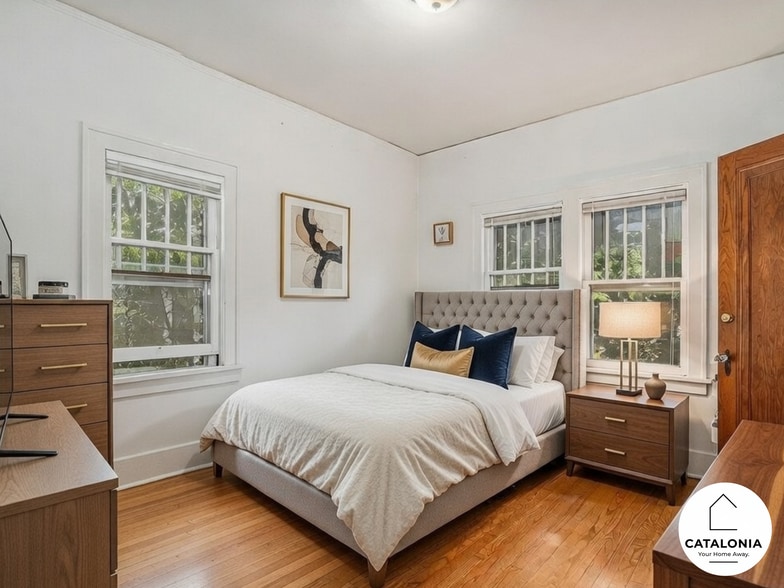 Bedroom 1 of 6 with full sized closet- located upstairs. - 2025 8th Ave