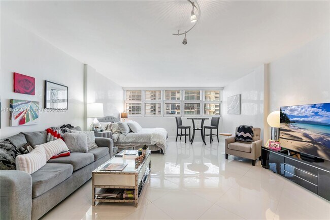 Building Photo - 10275 Collins Ave