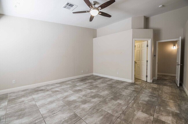 Building Photo - STUNNING 3 Bedroom Home with a 3 CAR GARAGE & RV PARKING!