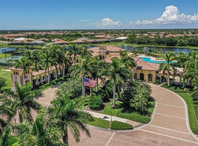 Building Photo - "Spacious 3-Bedroom Townhouse with Lake Views & Modern Finishes in Gran Paradiso"