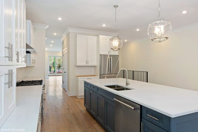 Building Photo - Condo Quality 3,400 SF Duplex Down in Roscoe Village, Pet Friendly Available August 1st