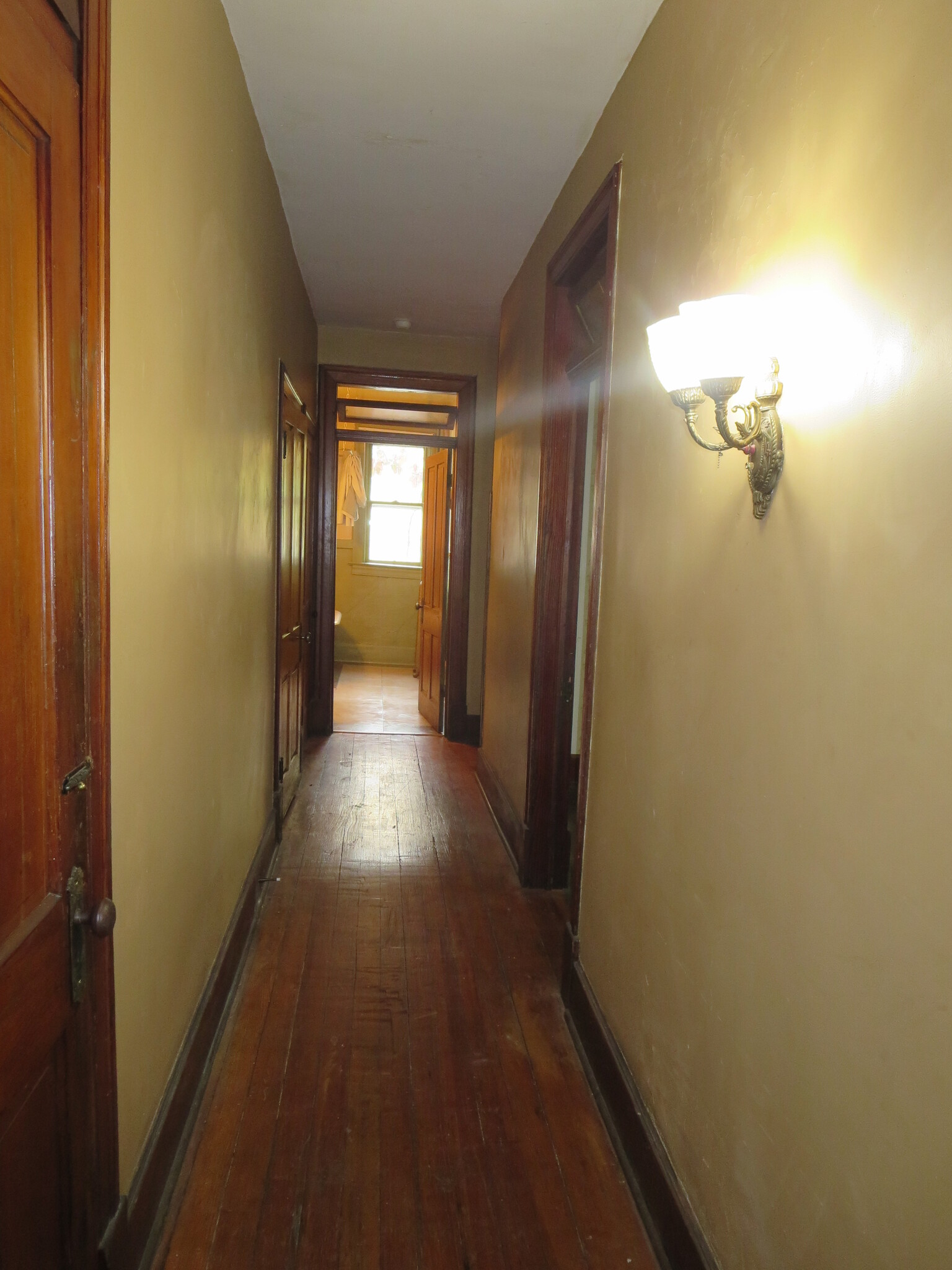 Hallway to Bathroom and Bedrooms. - 204 S 6th St