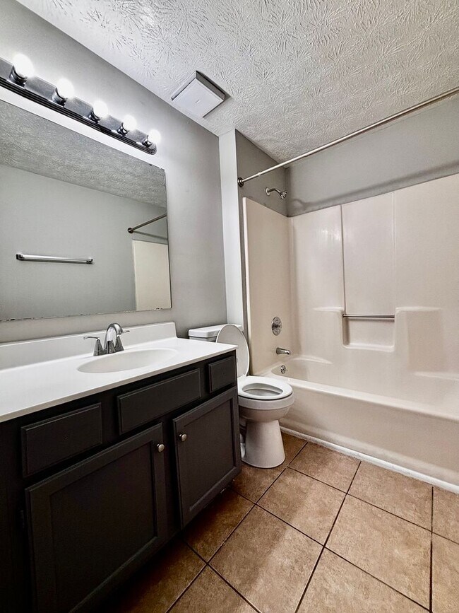 Building Photo - ONE MONTH FREE! Ask us how! A Fresh Start: Renovated 2-Bedroom in Serene Englewood with Washer/Dr...