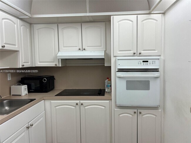 Building Photo - 19380 Collins Ave