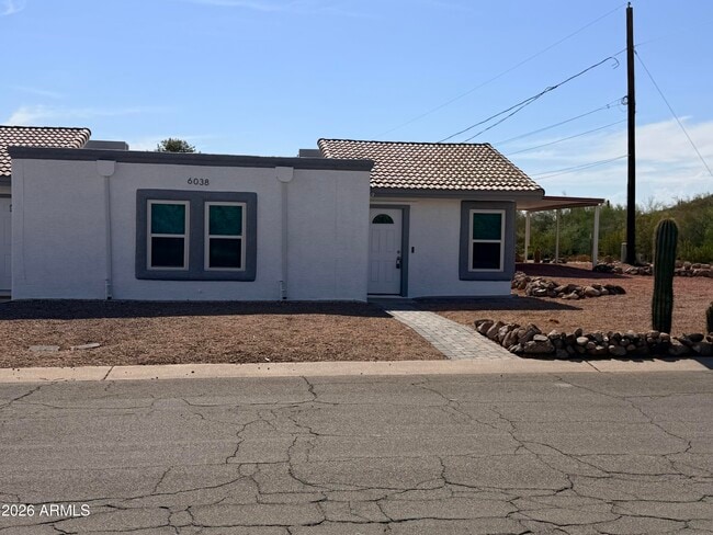 Building Photo - 6038 S Alameda Rd