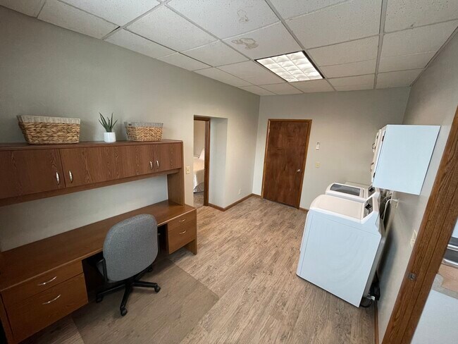 Laundry room with office space - 259 S Miami St