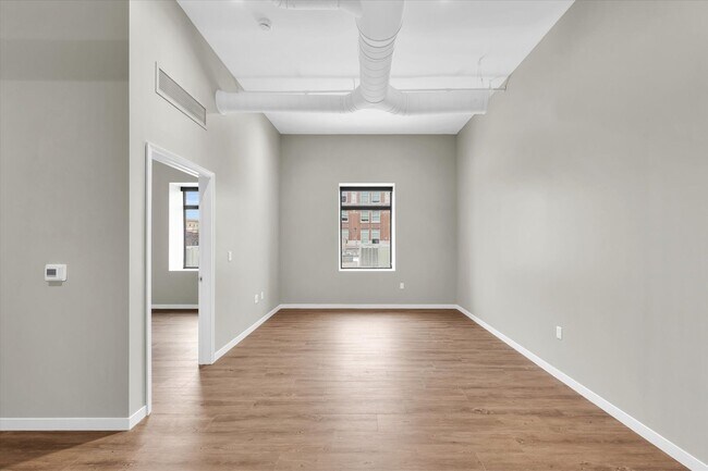 Building Photo - Live in Luxury! Stunning 1-Bedroom Apartment in Downtown Champaign