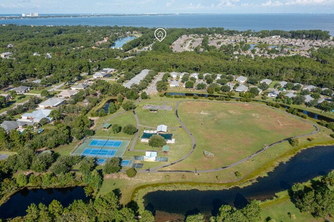Building Photo - "Coastal Elegance Awaits: Spacious 4-Bed Oasis with $400.00 Off First Full Months Rent!"