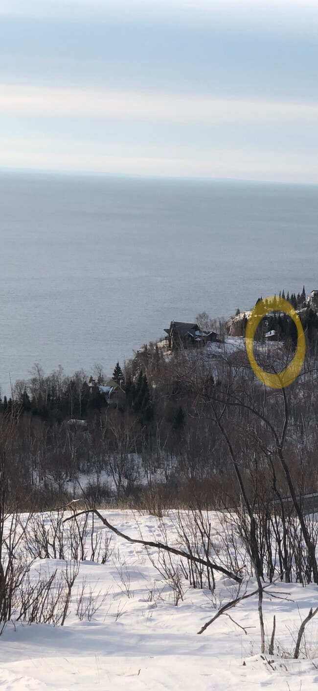 The cabin is located right above a beautiful bay - 6012 Highway 61