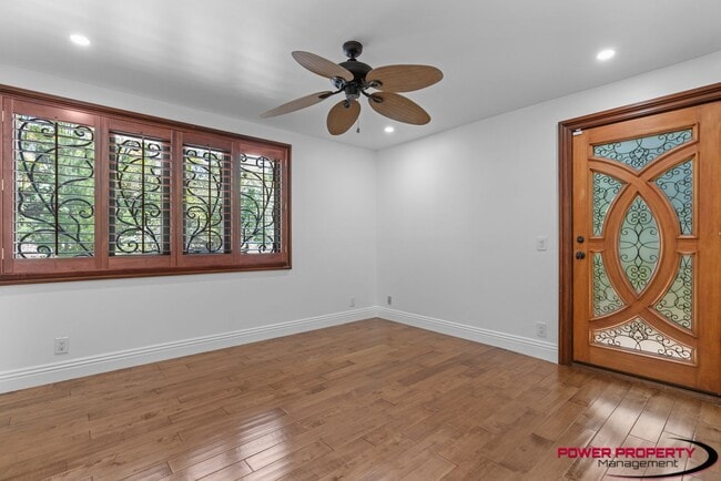 Building Photo - Spacious 5-Bedroom Home with Modern Amenit...