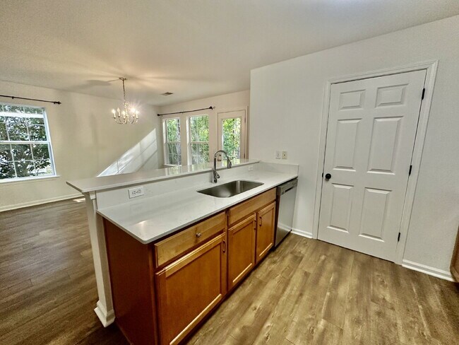 Building Photo - Four Bedroom, End Unit Townhome in the Farm!
