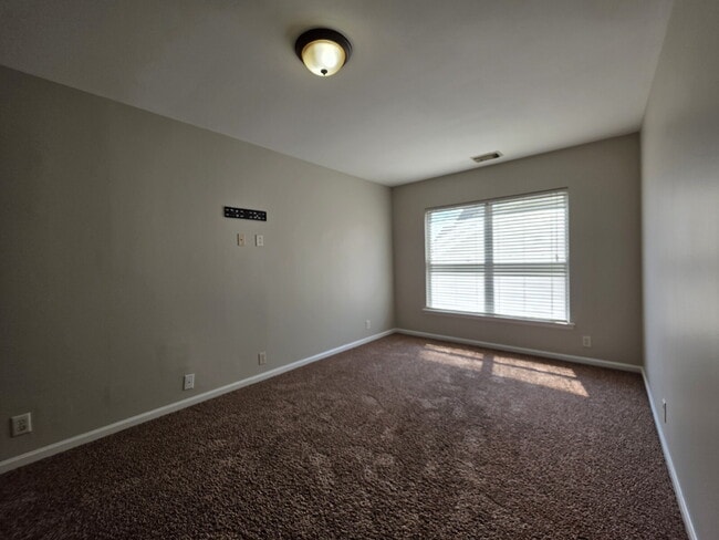 Building Photo - Lakefront 3BR/3BA with Covered Deck, Garage & Community Pool