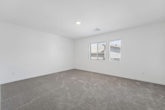 Building Photo - Modern Cadence Townhome with Sleek Finishes & Open-Concept Living!