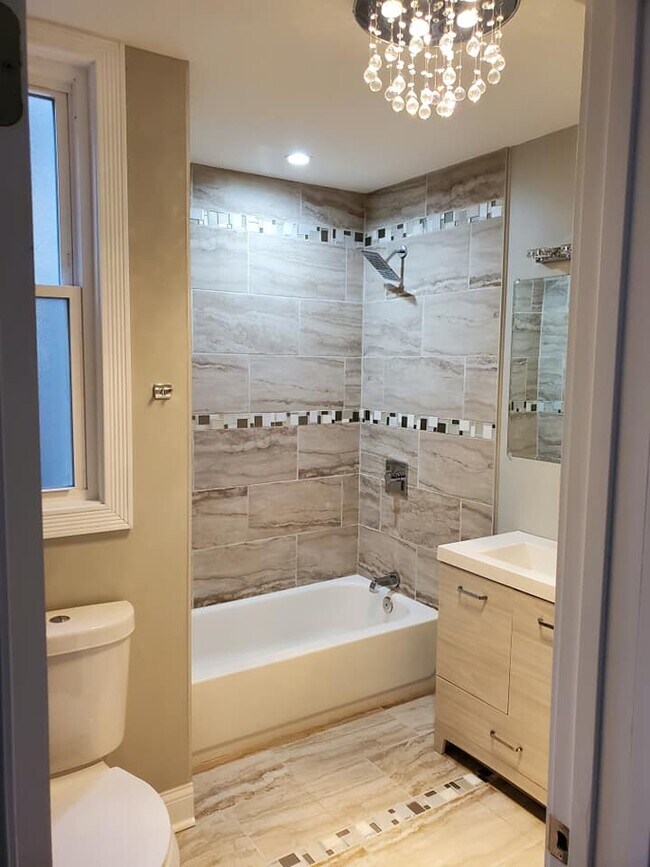 Building Photo - 229 E 55th Pl