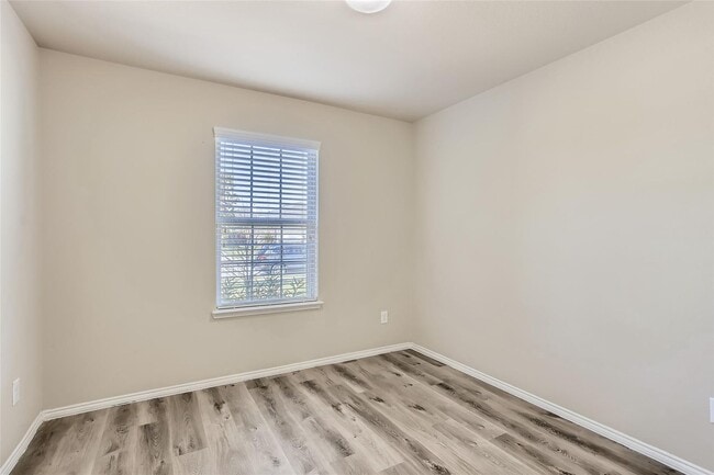 Building Photo - This well-maintained 4 bedroom home is located in a quiet neighborhood that has a community park ...