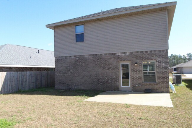 Building Photo - 4BR/2.5BA Home Near NAS Pensacola with First-Floor Primary, Stainless Kitchen & Covered Patio
